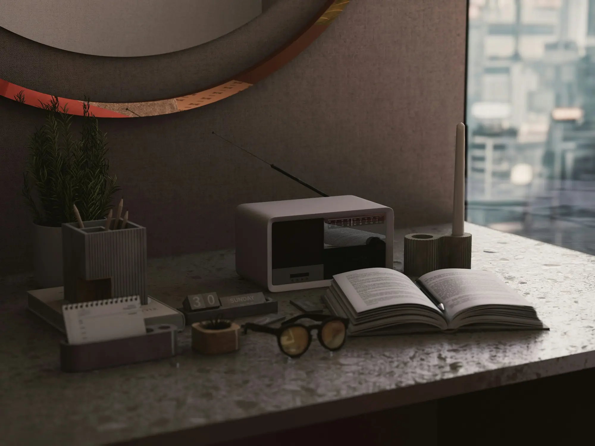 Livre ouvert et lunettes posés sur un bureau